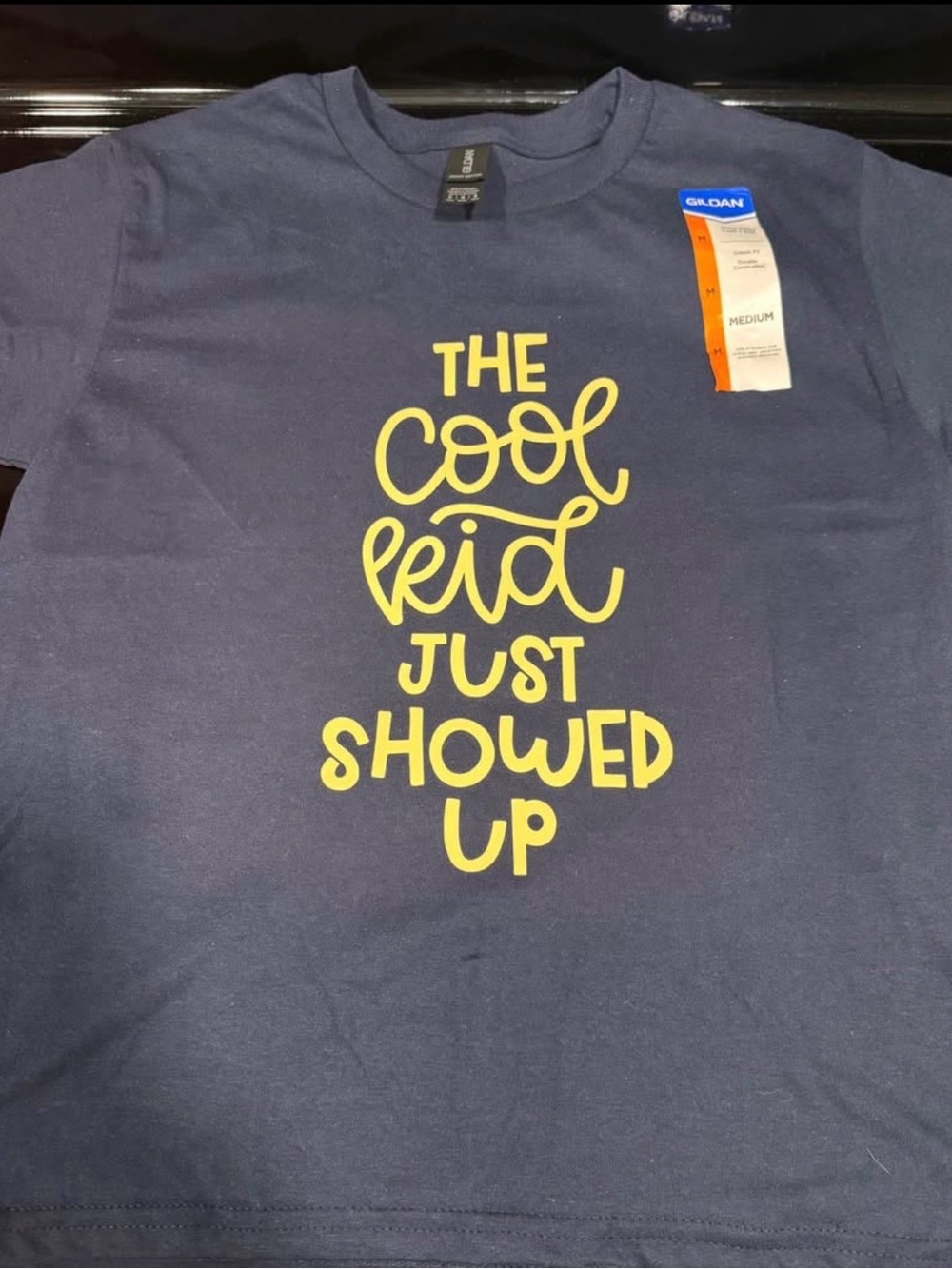 Gildan Navy T‑Shirt with Orange and White Tag